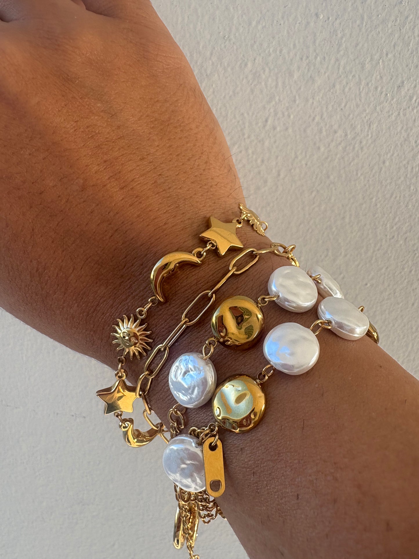 Gold and Pearl Bracelets